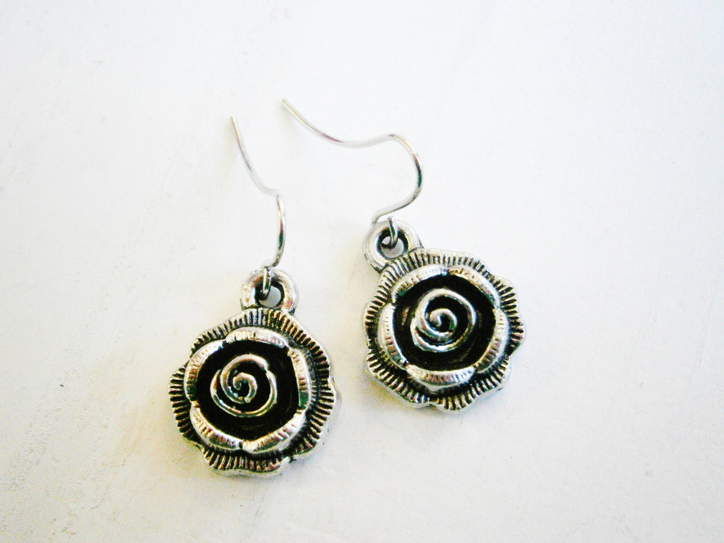 Antique Silver Rose Charm Pendant On Small Silver Plated Earring Hooks/Dangle Earrings/Rose Earrings.